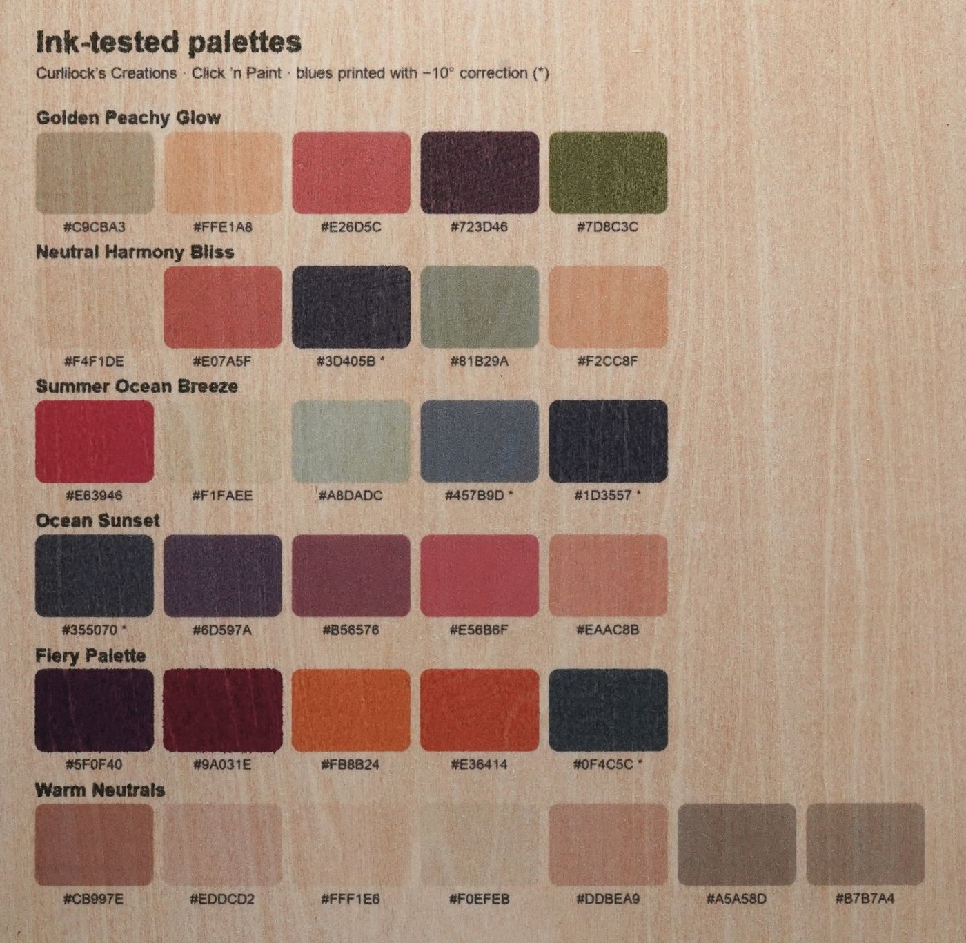 Our ink-tested palettes printed on a basswood panel, each color labeled with its hex code